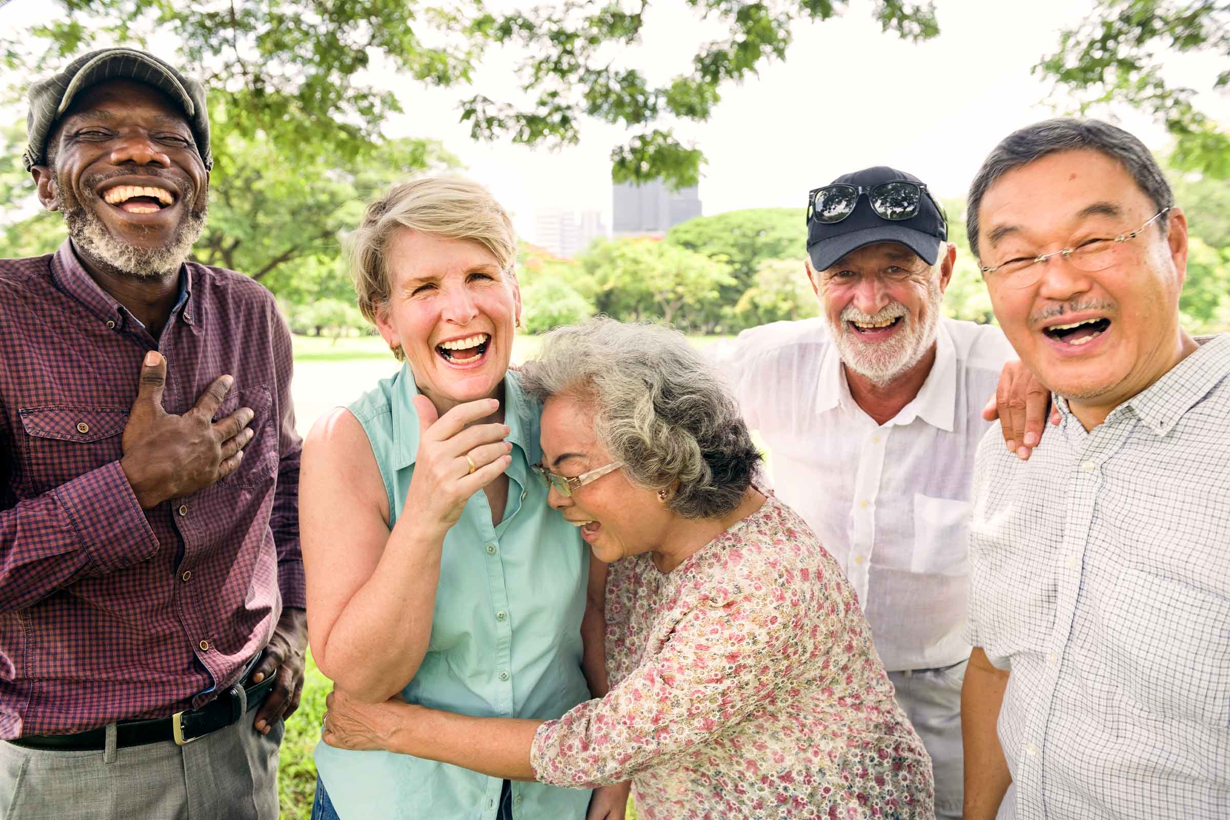 group of laughing senior friends at the park successful retirement strategies tallahassee fl